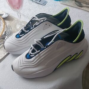 Adidas Adifom SLTN shoes in the Cloud White / SolarYellow / Blue Colorway